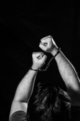 Hands in handcuffs