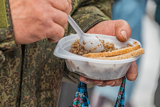 Feeding Homeless Military Refugees Who Fled Their Homes During The Bombing Of Civilians