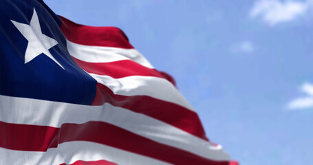 Detail of the national flag of Liberia waving in the wind on a clear day