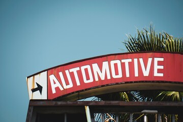 Old worn automotive repair shop sign