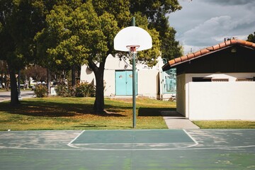 Outdoor basketball hoop at park © jdoms
