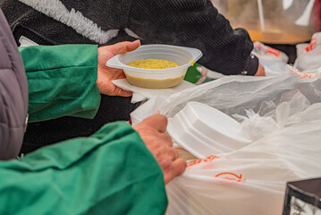 feeding homeless military refugees who fled their homes during the bombing of civilians
