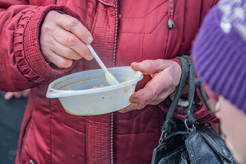 feeding homeless military refugees who fled their homes during the bombing of civilians