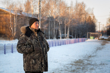 Portrait of an installer at the construction of an ice town