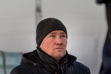 Portrait of an installer at the construction of an ice town