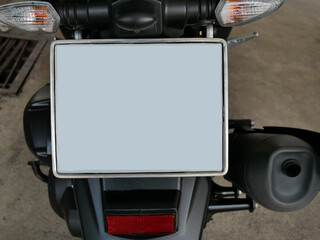 blank license plate or vehicle registration on motorcycle background.