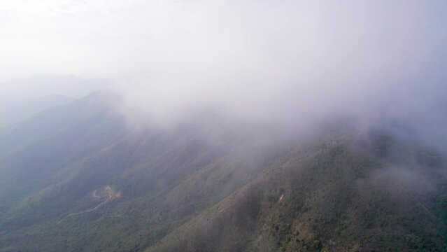 Aerial footage flying through the Wong Leng, Pat Sin Leng, Tai Po, Hong Kong. In a cloudy day