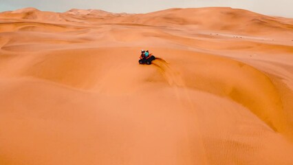 Driving Atv's in the Namibian desert, ATV in desert, warm sunny day