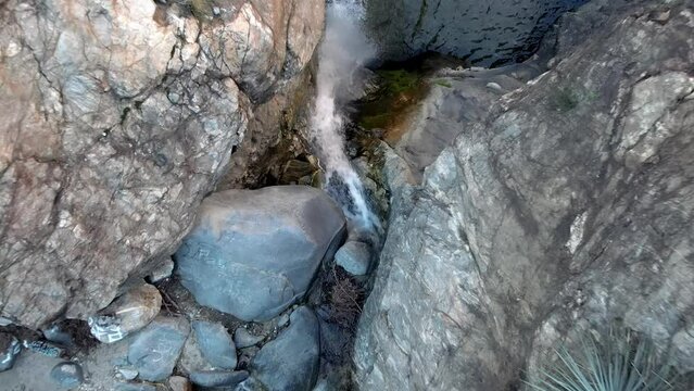 Eaton Canyon waterfall - straight down bird's eye view ascending over the falls and river