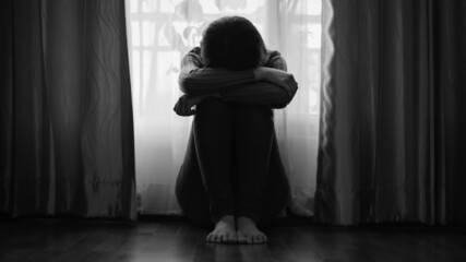  woman sit Depression and anxiety Copy space. Balck and white