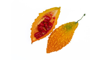 yellow ripe bitter gourd on white background