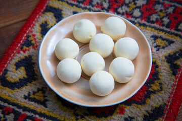 Traditional oriental appetizer kurt on a wooden background 