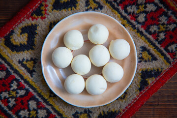 Traditional oriental appetizer kurt on a wooden background 