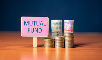mutual fund sign board with growing coins and stack of money - concept of Investment, savings and wealth creation. - obrazy, fototapety, plakaty