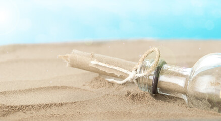 Sandy Beach with a Message in the Bottle