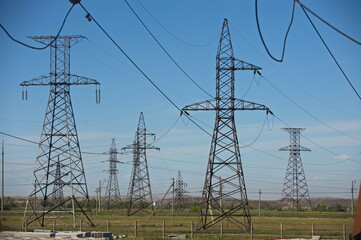 Pavlodar, Kazakhstan - 05.29.2015 : High-voltage power lines with transformers, insulators, and wires.