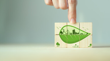 Zero emisson, ecological and net zero concept.  Eco friendly symbols with green leaves on wooden cubes.  Sustainable development strategy. Environmental, climate change concept. Save world CSR banner. - obrazy, fototapety, plakaty