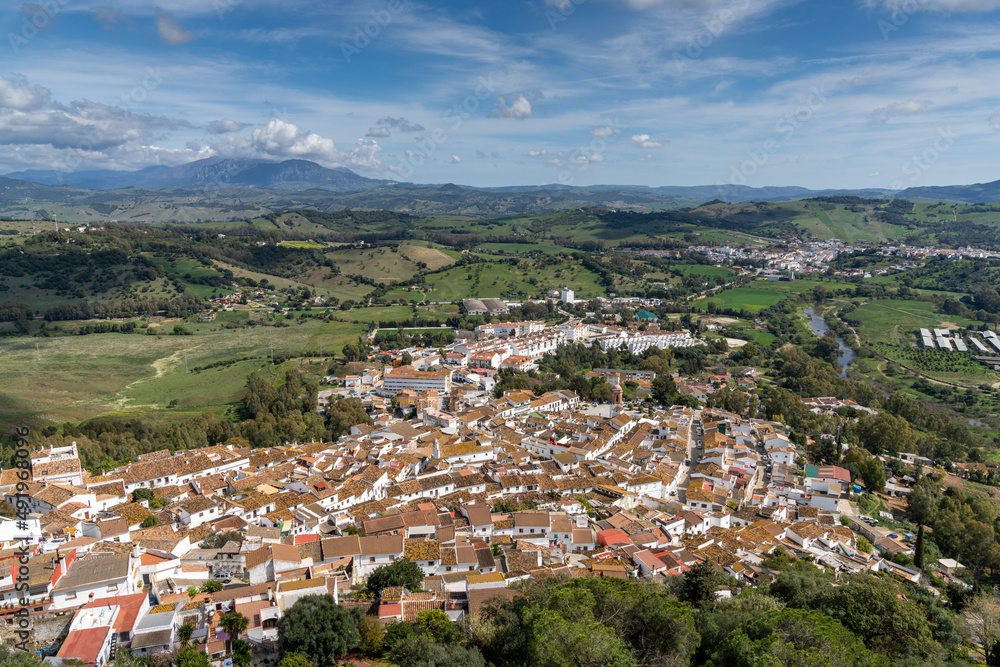 Sticker whitewashed village of Jimena de la Frontera high angle view with rooftops and countryside