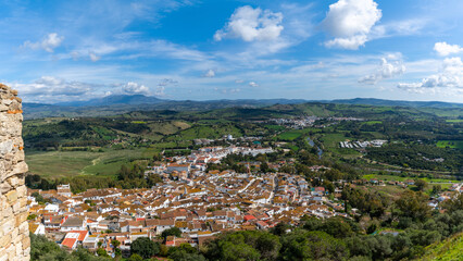 Fototapeta na wymiar whitewashed village of Jimena de la Frontera high angle view with rooftops and countryside