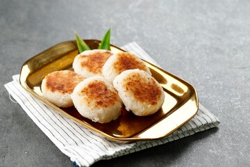 Round Wingko Babat, Traditional Indonesian Snack Made from Glutinous Rice Flour, Sugar, and Grated Young Coconut.