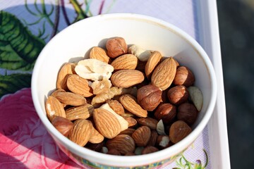 Fresh, unroasted almonds in a bowl