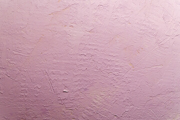 Obraz premium Old wall with peeling stucco. Craquelure pink textured background. Abstract concrete interior