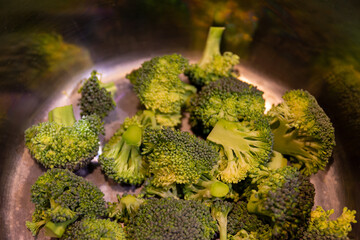 brocolli in a pot in the kitchen