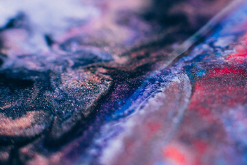 Fototapeta premium Liquid paint art. Macro ink background. Pink dark purple blue colors mix