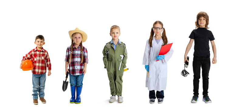 Set of full-length portraits of little boys and girls, children in image of different professions posing isolated over white background