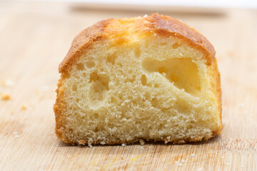 single slice of Pound cake on cutting board isolated on white background,