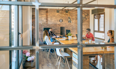 People in an informal business meeting in the office