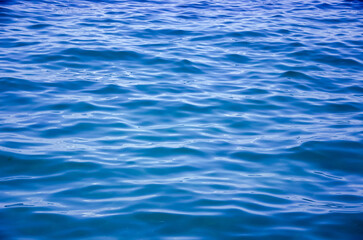 Fototapeta premium Abstract sea background smooth waves of blue water