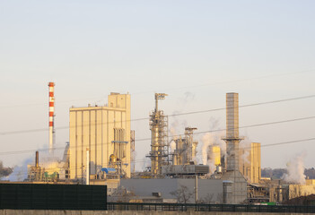 Obraz premium Fumes and pollution in factory chimneys