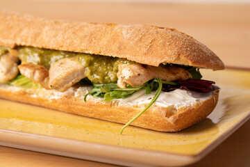 tasty fresh grilled turkey breast sandwich with green pesto