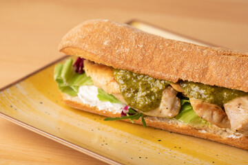 tasty fresh grilled turkey breast sandwich with green pesto