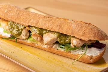 tasty fresh grilled turkey breast sandwich with green pesto