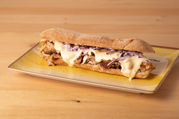 tasty melted cheese on pulled pork sandwich