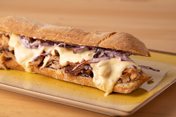 tasty melted cheese on pulled pork sandwich