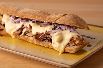 tasty melted cheese on pulled pork sandwich