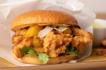 details of fresh fried chicken burger with mango