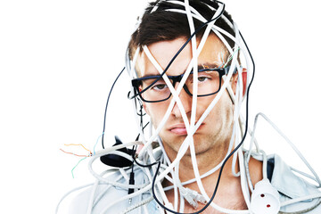 This is not going well. Studio portrait of a young man with cables hanging over his head isolated...
