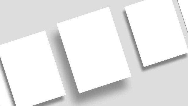 Group of White Paper Blanks Moving Diagonally with shadows on Natural Light Grey background (Flat Lay Animation)  Branding Identify, Business Cards or Magazine pages and Social Posts	
