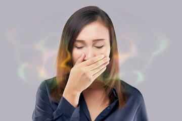 Asian female in blue wear have bad breath. Halitosis - obrazy, fototapety, plakaty