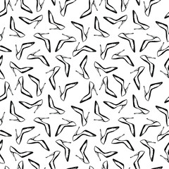 Seamless pattern with high heels glamour shoes. Hand drawn black and white pattern isolated on white background. Design for textile, wrapping paper, curtains, clothes, home decor.