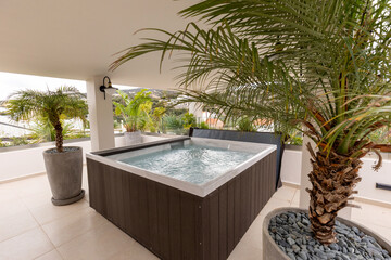 Hydromassage bathtub on the hotel terrace