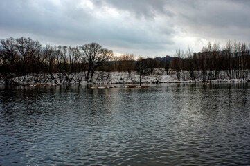 river bank on a cloudy winter day