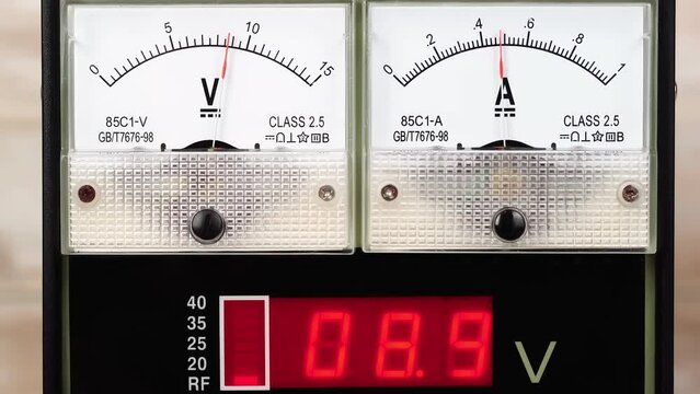 Arrow of the analog DC voltmeter and ampmeter shows the value volts and electricity. digital DC voltmeter and ampmeter shows the value volts and electricity.		