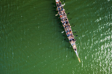 Aerial view of dragonboat with athletes during competition