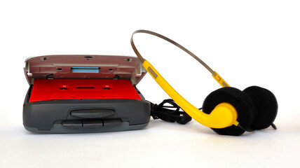 Vintage Cassette Player with headphones and cassette tape isolated on a white background