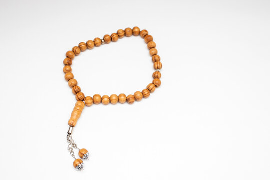 Muslim Rosary Beads On White Background.